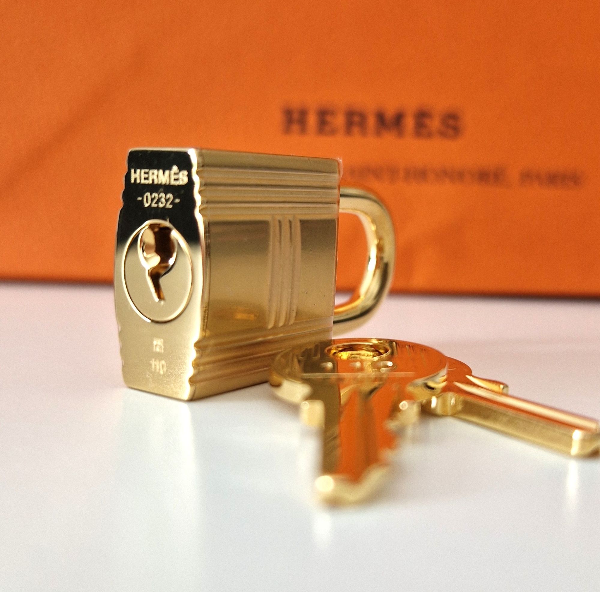 Hermes lock and key gold hardware